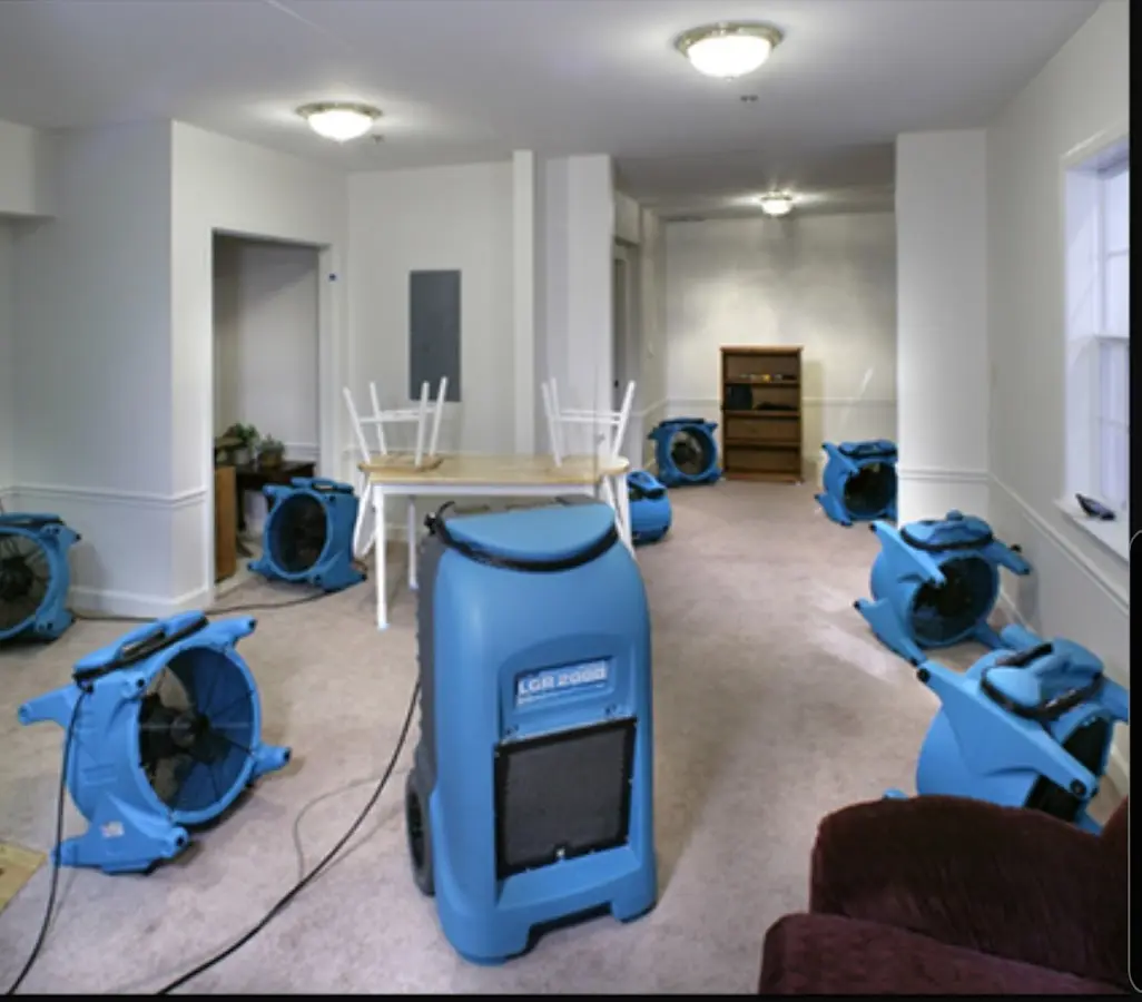 Air movers and dehumidifier setup for Water Damage Restoration in Orion